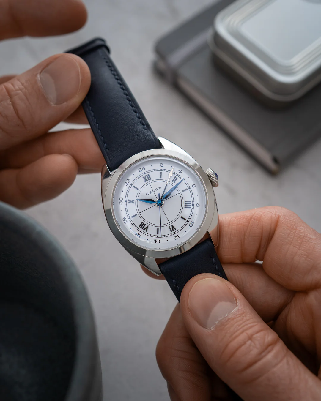 Héron Mirabel GMT on a blue leather strap