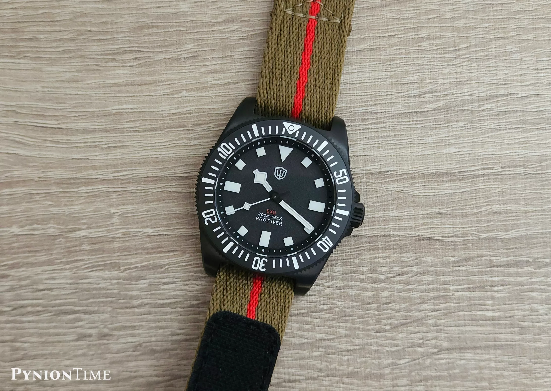 Watchdives EXD 40mm on a green and red nylon strap