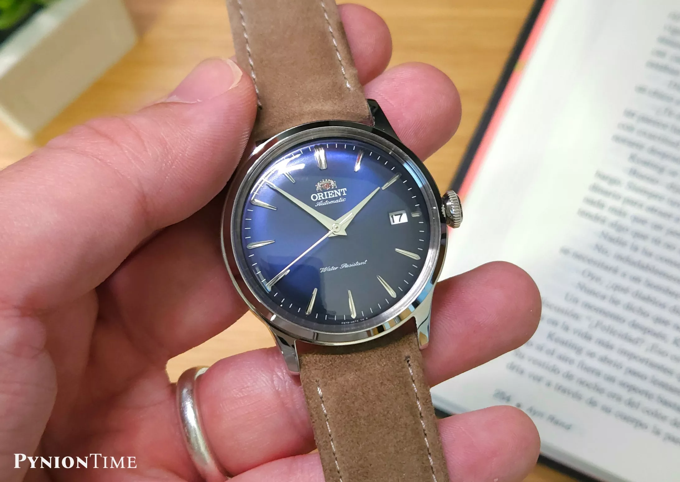 Orient Bambino RA-AC0M12L30B has a sunburst dial finishing
