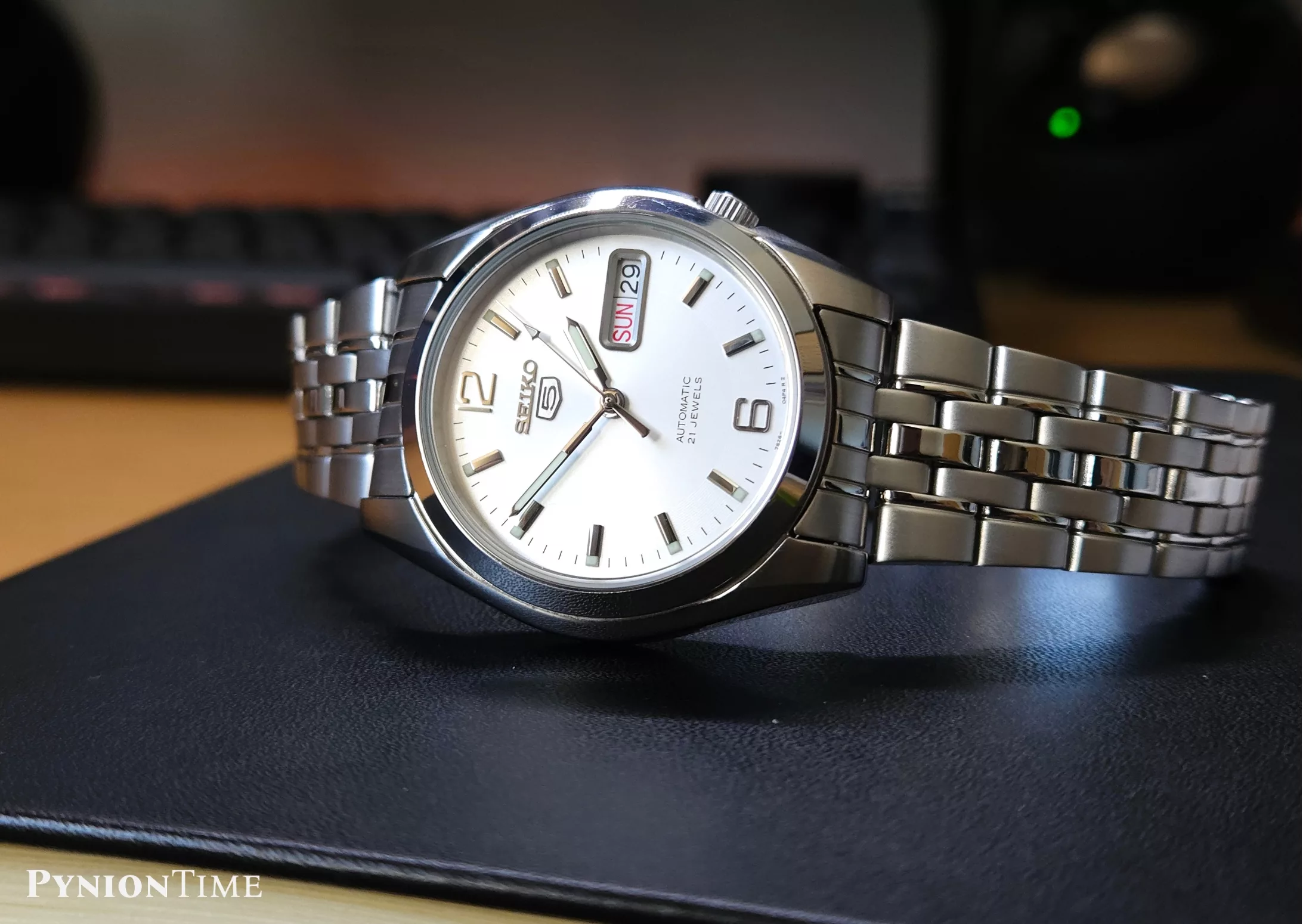 The Seiko 5 SNK385 comes with Hardlex instead of sapphire