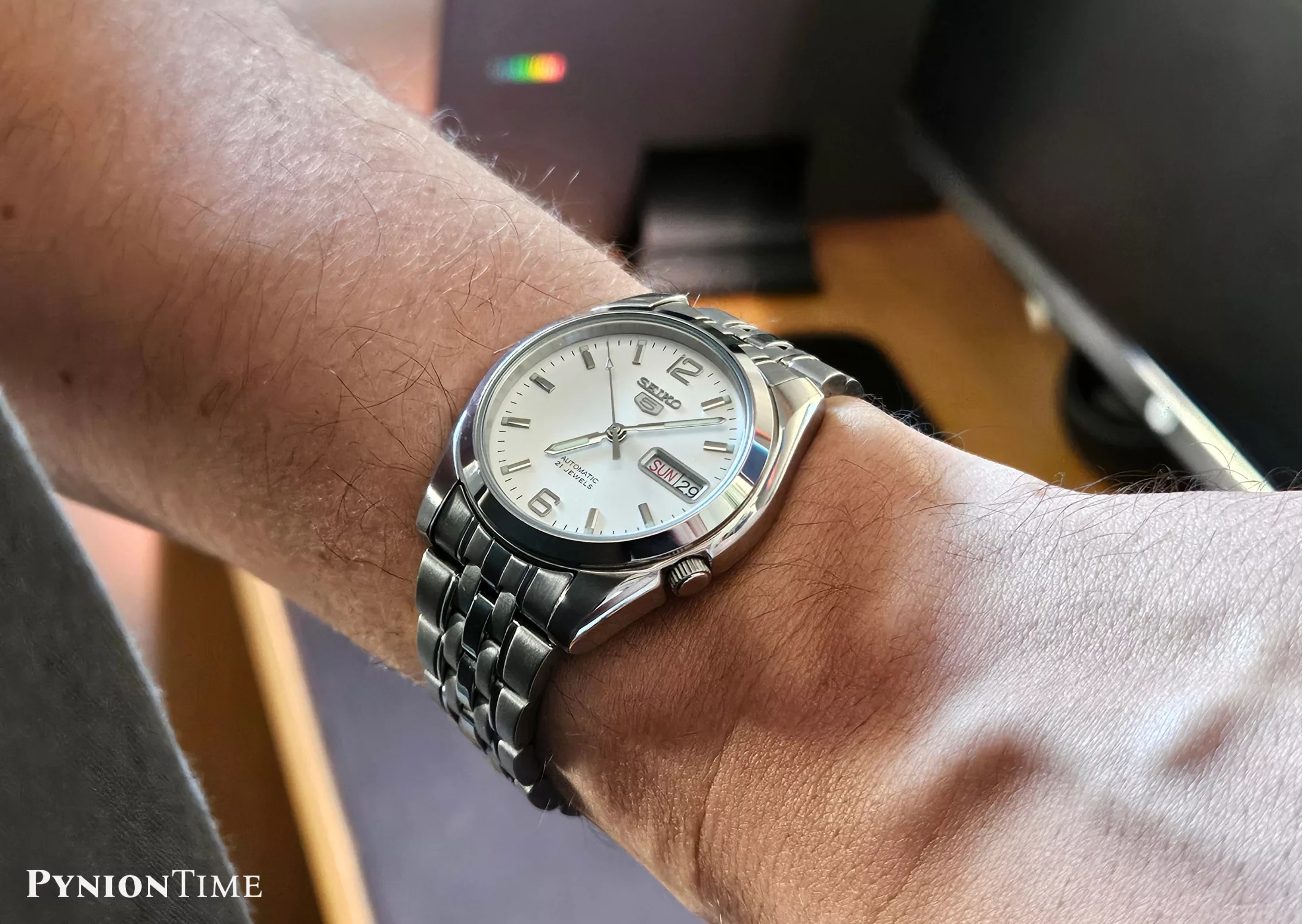 It has a few light case scratches after ownership, but the crystal remains clean