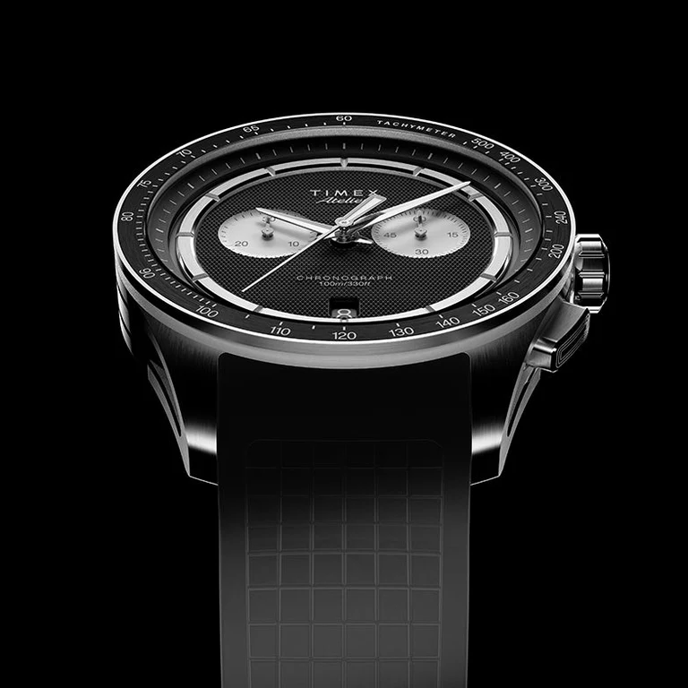 The Timex Atelier Chronograph Quartz M1q has got contrasting silver subdials on black