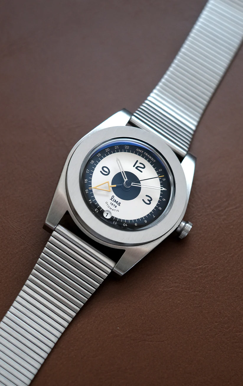 The Reversed Tuxedo version flips the dial contrast for a darker layout