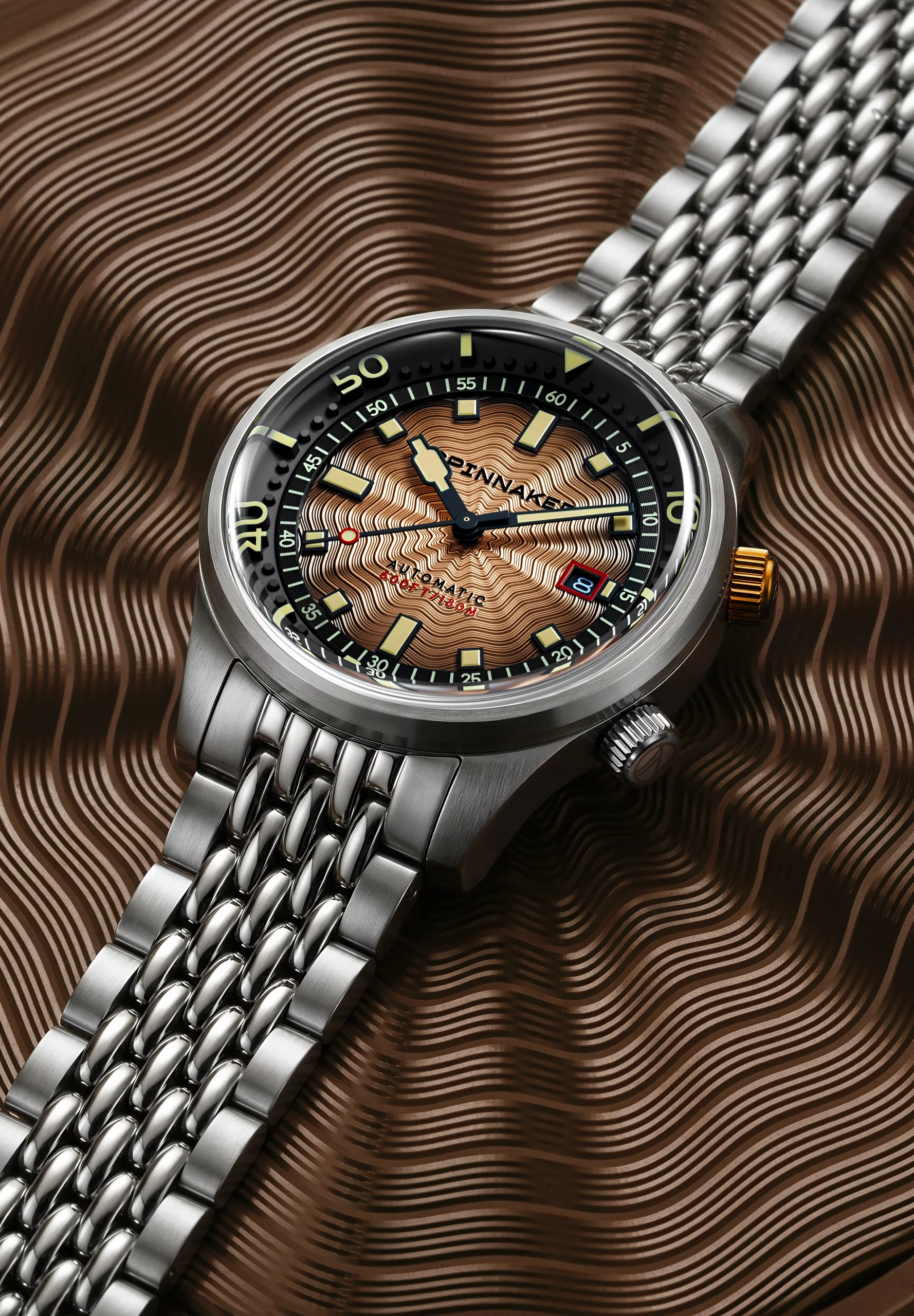 The Spinnaker Bradner Automatic has got an Amber Dawn dial with a guilloché fumé finish