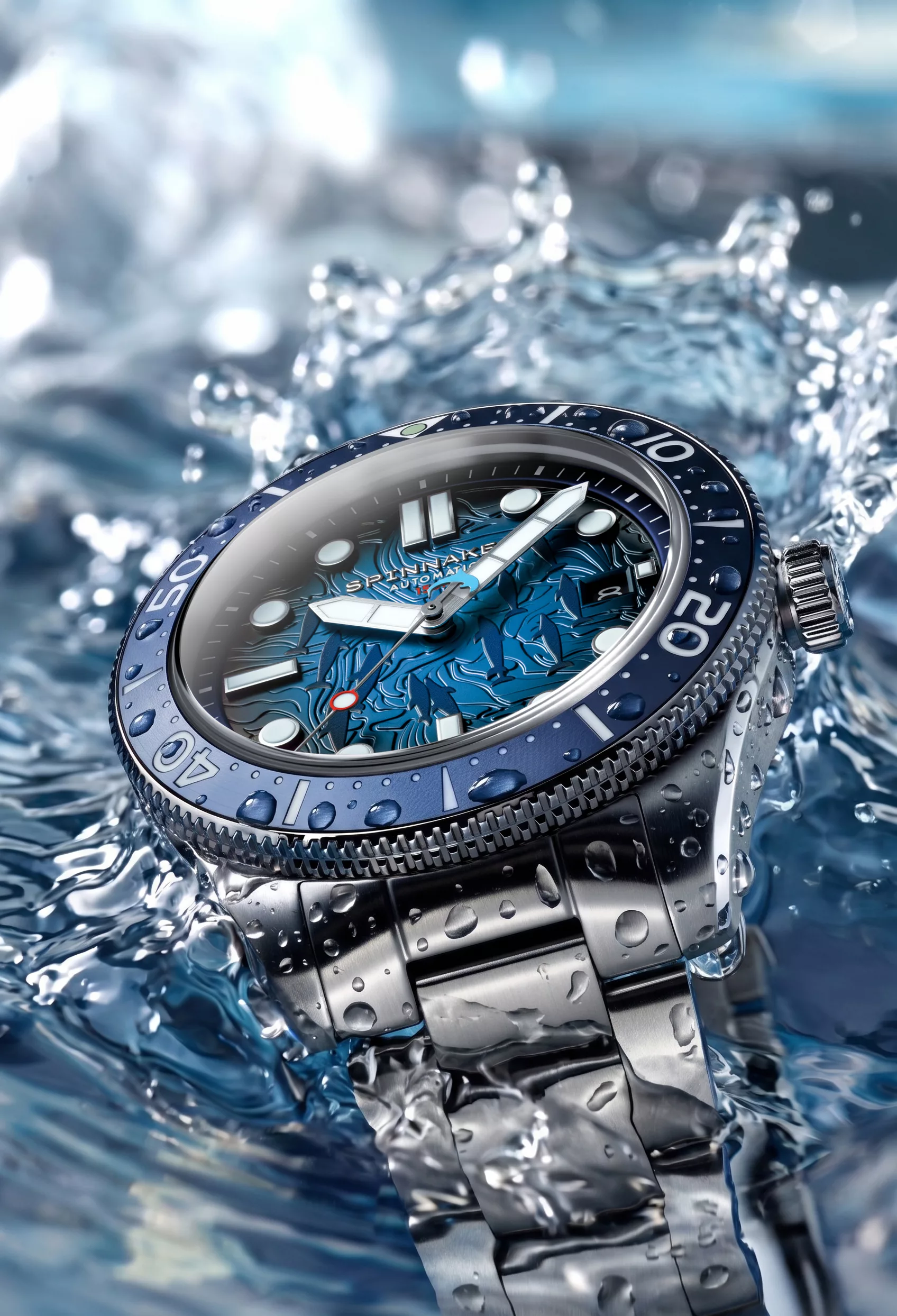 The textured wave-pattern dial shows dolphins swimming across the ocean-inspired surface