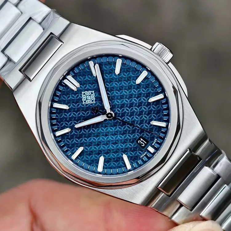 Ixdao Warrior on a blue pressed pattern dial