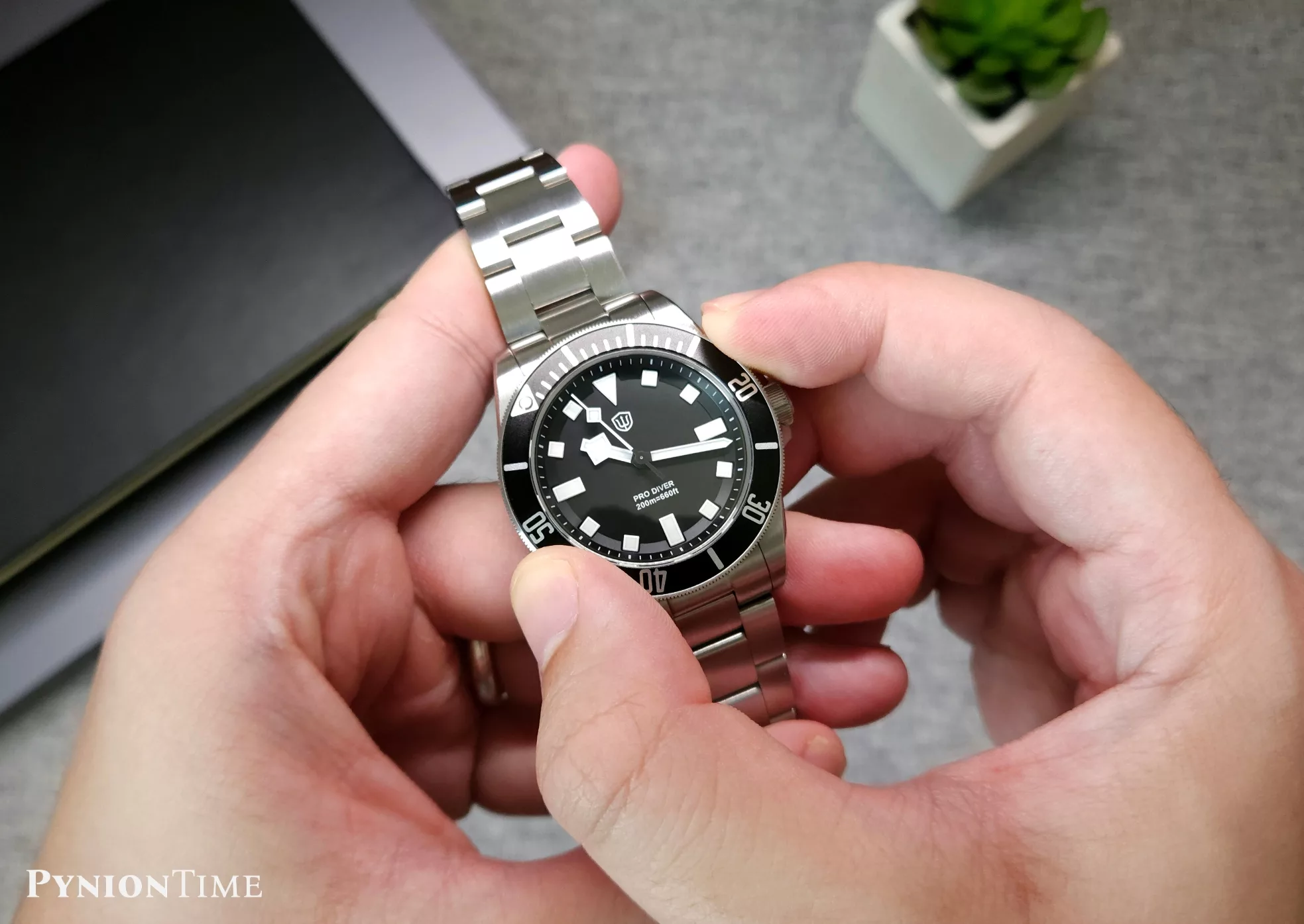 Bezel detail, showing the aluminum insert and the Black Bay-inspired shape