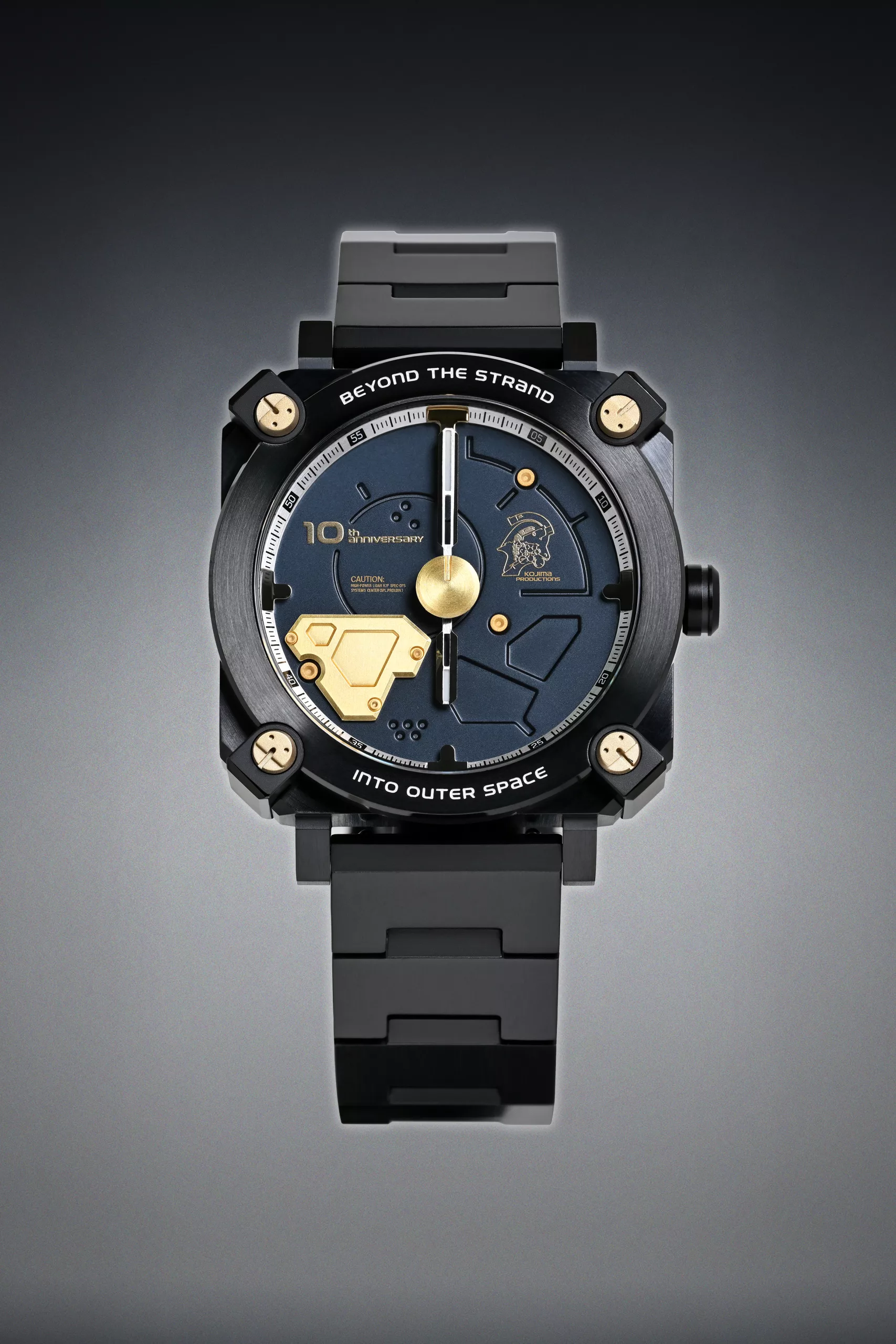 The bezel has "BEYOND THE STRAND" and "INTO OUTER SPACE" engraved around its edge