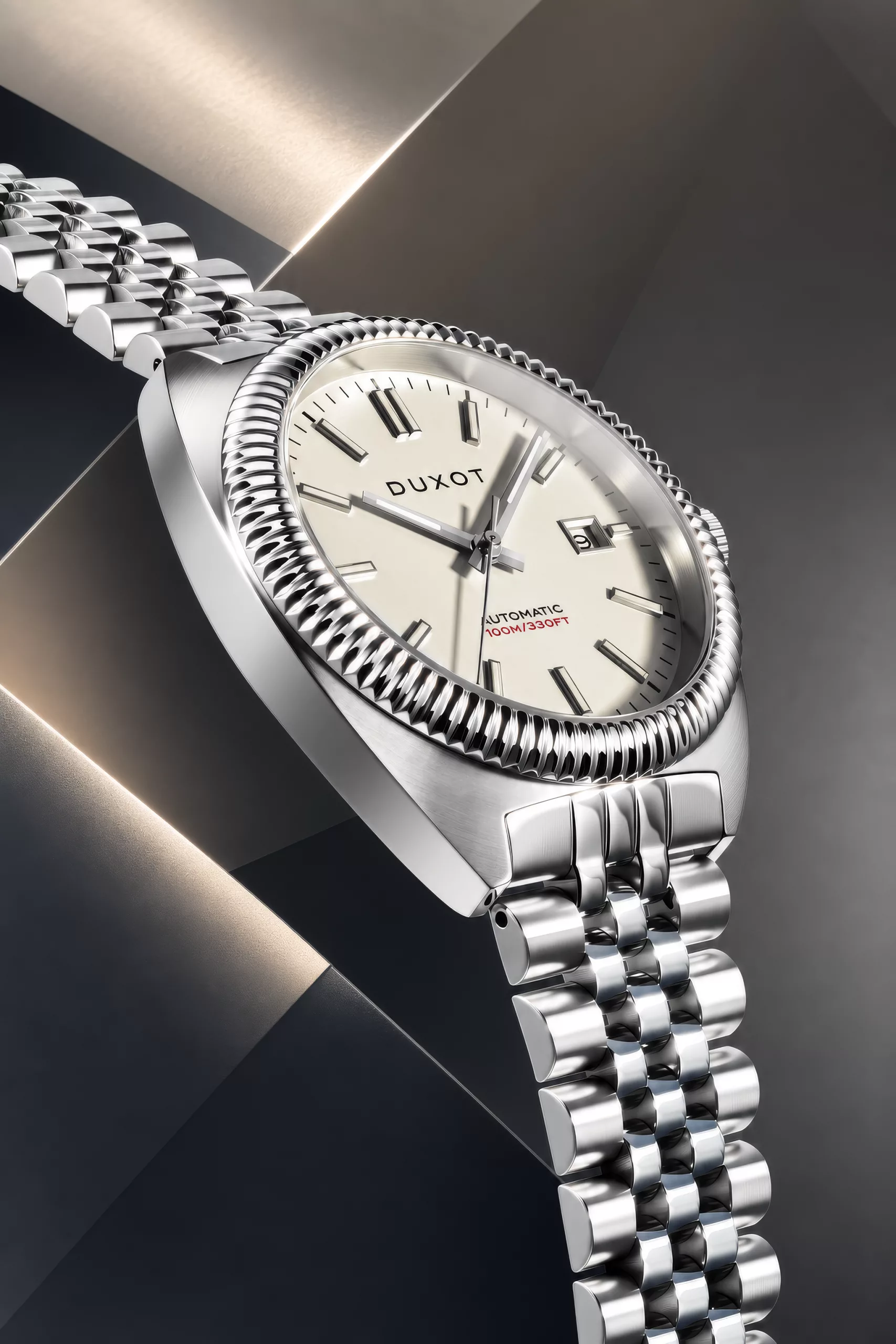 The Siena Automatic has a gently barrel-shaped 40mm stainless steel case with a fluted bezel