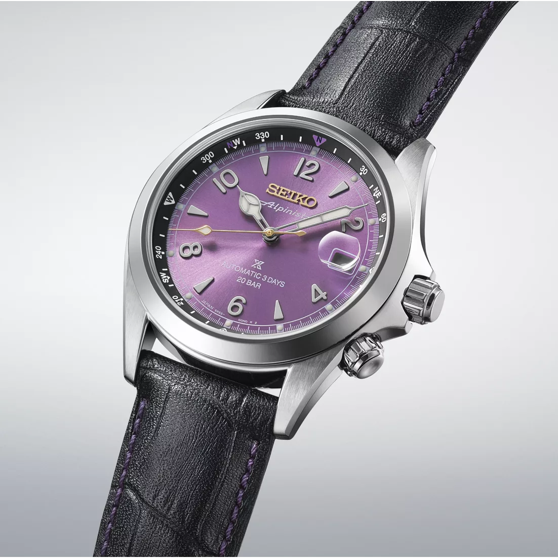 The Alpinist HBC006 has a purple dial with wedge-shaped indexes and gold-colored logo and seconds hand accents