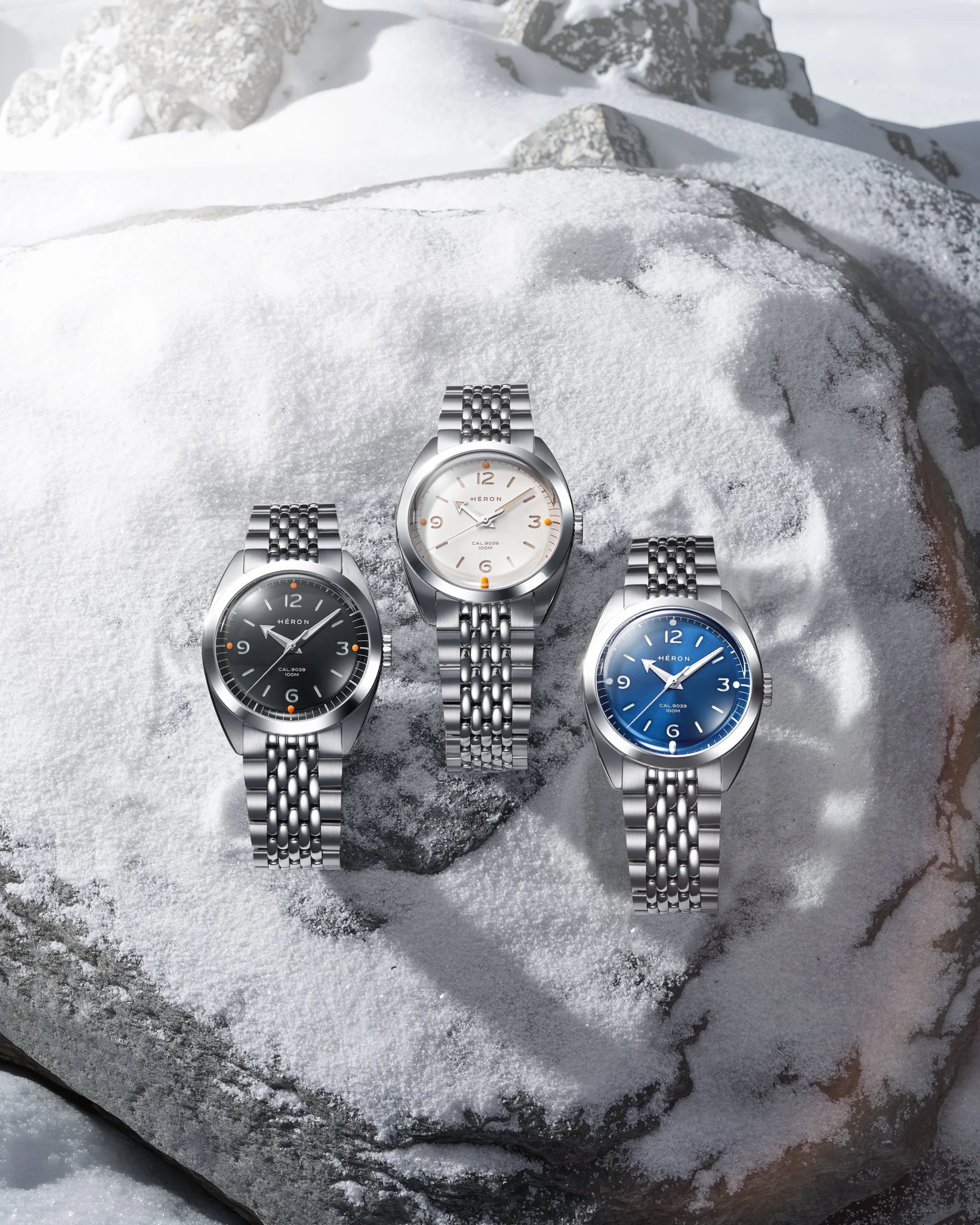 It uses a two-layer sandwich dial with raised spherical lume blocks at each quadrant