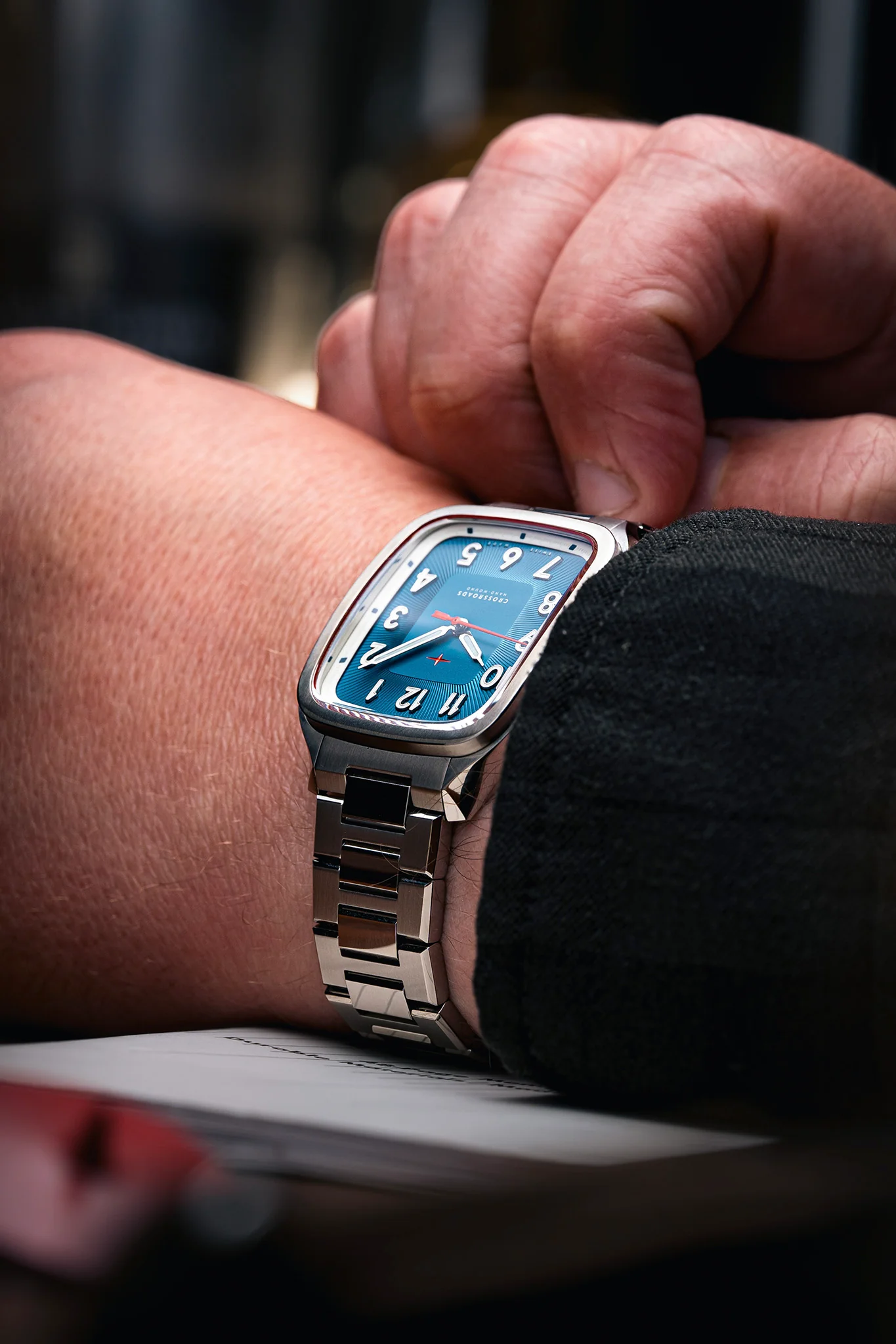 It uses a double-domed sapphire crystal with a hollowed underside and interior anti-reflective coating