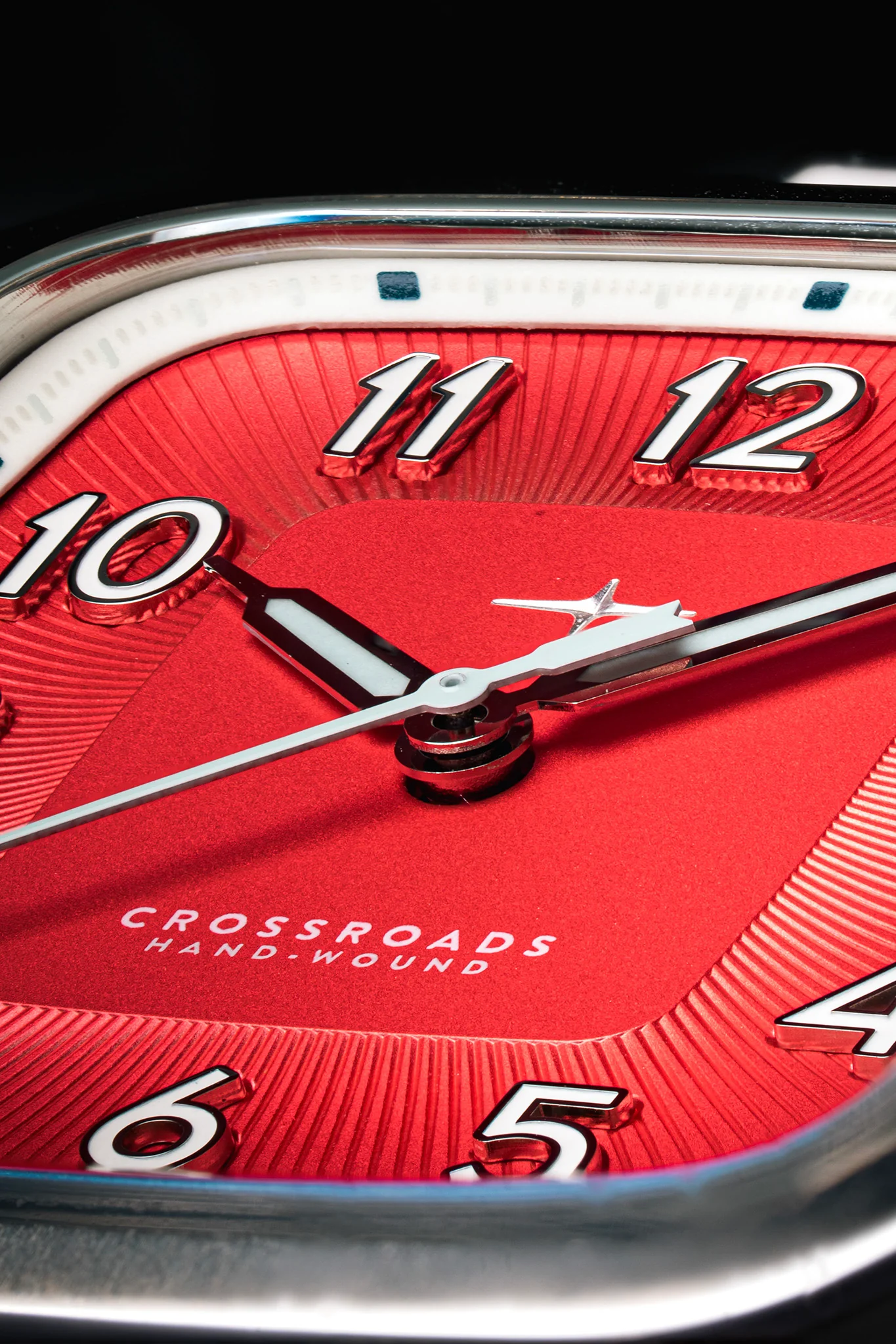 The Trafford Crossroads Core has a sunburst dial with a raised, sloping centre section